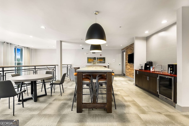 747 Ralph Mcgill Blvd NE Unit 223, Atlanta, GA 30312 - dining space with beverage cooler, light carpet, and recessed lighting