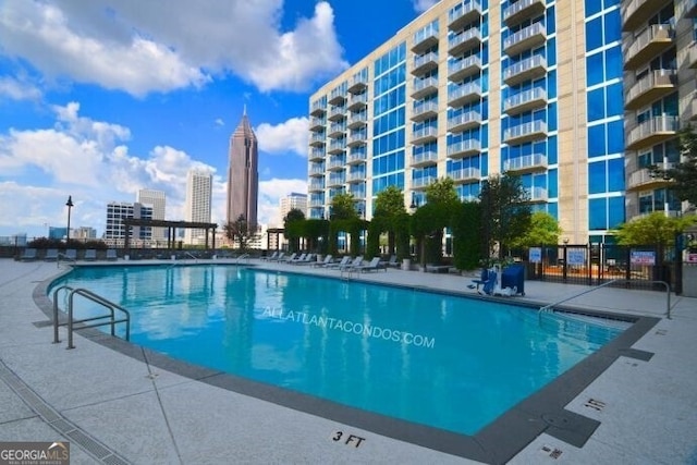 community pool featuring a view of city
