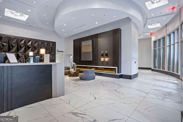 welcome area with a skylight and visible vents