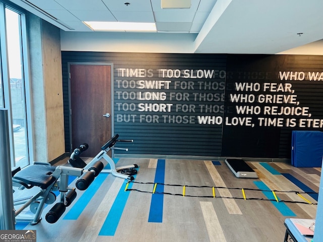 workout room with wood finished floors