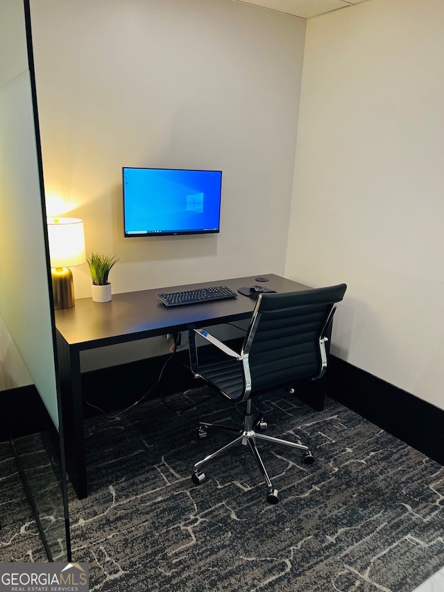 home office featuring baseboards