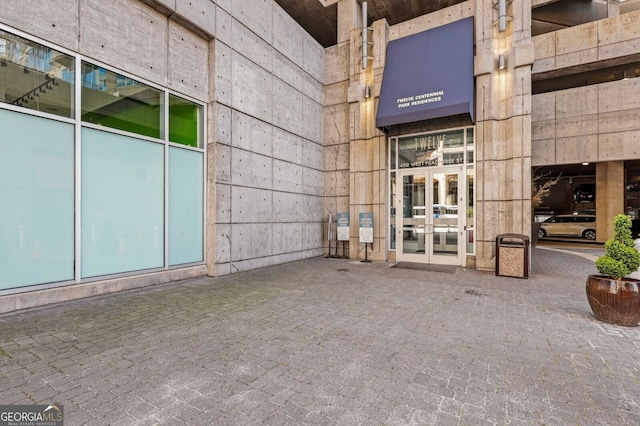 entrance to property featuring french doors