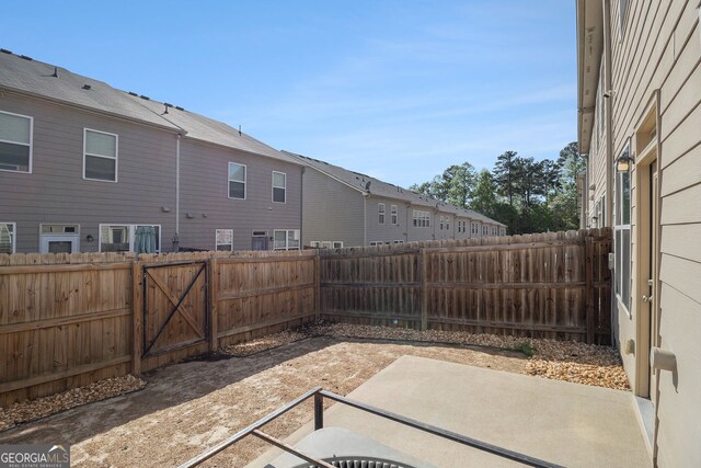 view of front of home featuring a garage, brick siding, and driveway