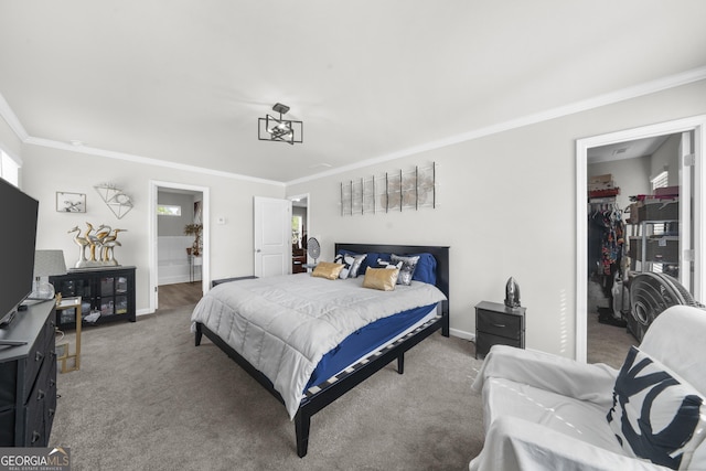 carpeted bedroom with ornamental molding and baseboards