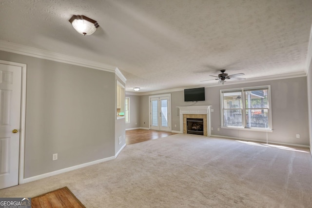 72 Grayson New Hope Rd, Grayson, GA 30017 - unfurnished living room with crown molding, a ceiling fan, and light carpet