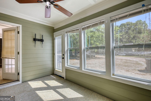 72 Grayson New Hope Rd, Grayson, GA 30017 - unfurnished sunroom with crown molding, carpet floors, and wooden walls