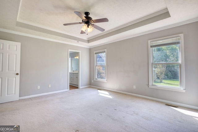 72 Grayson New Hope Rd, Grayson, GA 30017 - unfurnished bedroom featuring carpet flooring, crown molding, and a raised ceiling