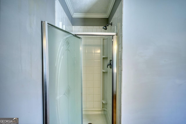 72 Grayson New Hope Rd, Grayson, GA 30017 - full bathroom featuring a shower stall, a textured ceiling, and crown molding