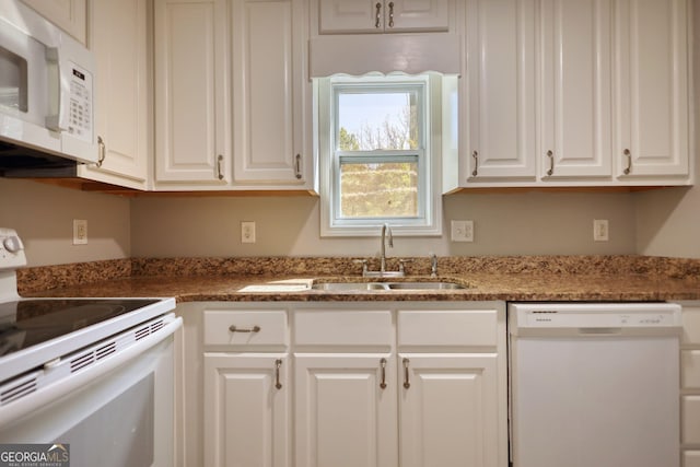 72 Grayson New Hope Rd, Grayson, GA 30017 - kitchen featuring a sink, stone counters, white cabinets, and white appliances