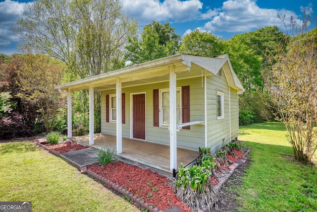 72 Grayson New Hope Rd, Grayson, GA 30017 - view of outdoor structure with a porch