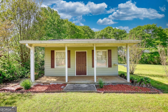72 Grayson New Hope Rd, Grayson, GA 30017 - bungalow-style home featuring a porch and a front lawn