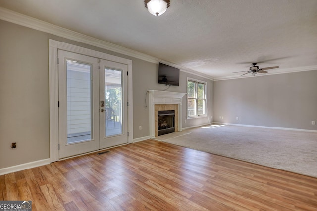 72 Grayson New Hope Rd, Grayson, GA 30017 - unfurnished living room with a fireplace, baseboards, and crown molding
