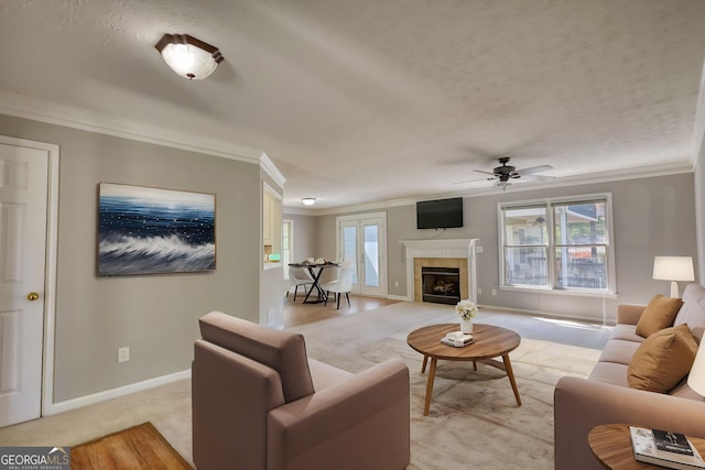 72 Grayson New Hope Rd, Grayson, GA 30017 - living area featuring light carpet, ornamental molding, and a ceiling fan