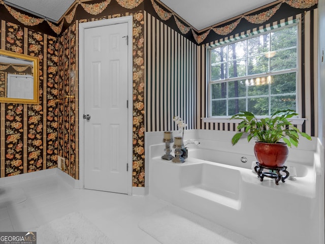 75 The Farm Rd, Mcdonough, GA 30252 - full bath with wallpapered walls, tile patterned flooring, and a garden tub