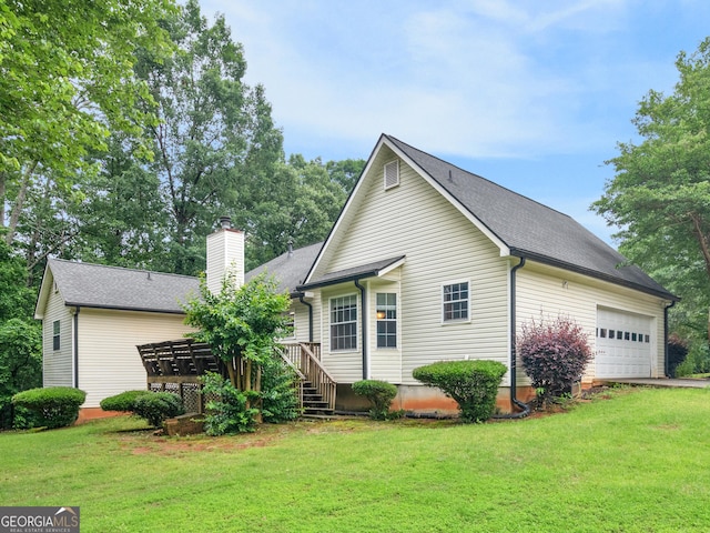 75 The Farm Rd, Mcdonough, GA 30252 - view of front of home featuring a garage, a chimney, a front lawn, driveway, and a wooden deck