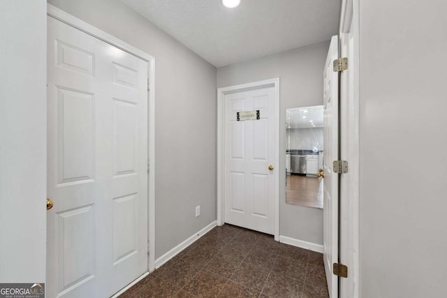 corridor with baseboards