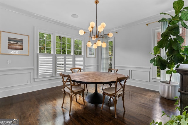 1116 Dan Johnson Rd NE, Atlanta, GA 30307 - dining area featuring an inviting chandelier, ornamental molding, a wainscoted wall, and plenty of natural light