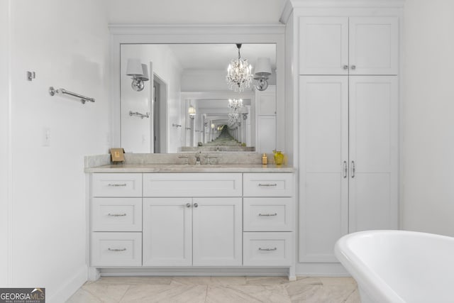 1116 Dan Johnson Rd NE, Atlanta, GA 30307 - bathroom featuring a notable chandelier, a soaking tub, baseboards, marble finish floor, and vanity