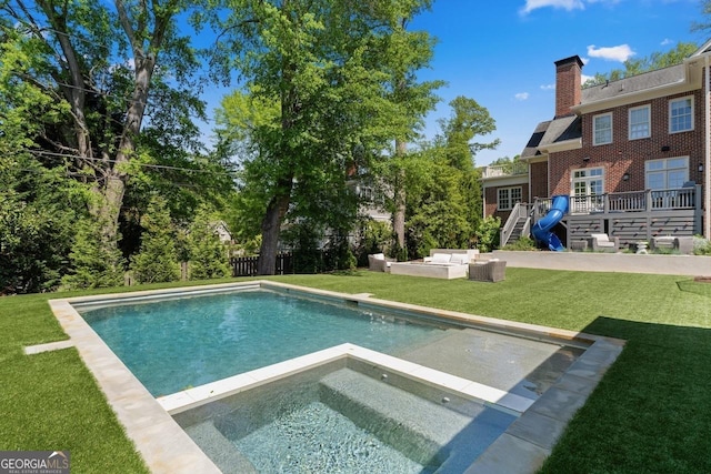 1116 Dan Johnson Rd NE, Atlanta, GA 30307 - pool with an outdoor hangout area, a yard, an in ground hot tub, and a wooden deck