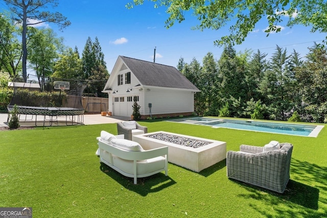 1116 Dan Johnson Rd NE, Atlanta, GA 30307 - view of yard with an outbuilding, fence, an outdoor pool, a garage, and a trampoline
