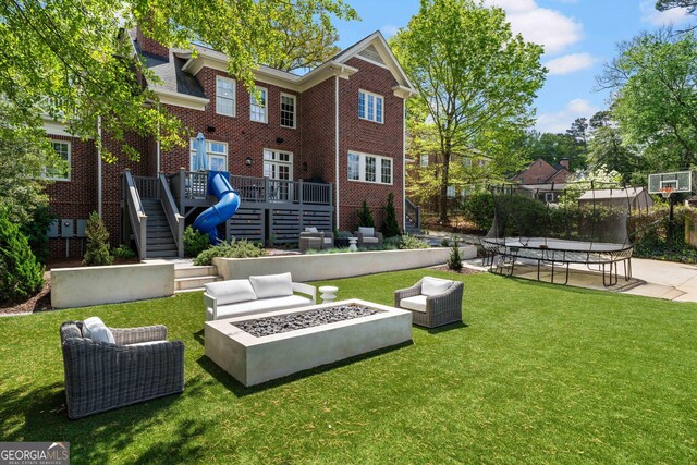1116 Dan Johnson Rd NE, Atlanta, GA 30307 - view of community featuring an outdoor living space with a fire pit, a yard, a deck, and stairs