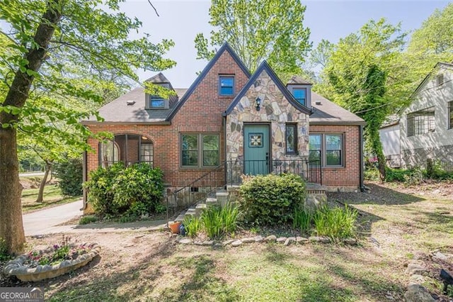 1884 Montrose Dr, East Point, GA 30344 - tudor house featuring brick siding and stone siding