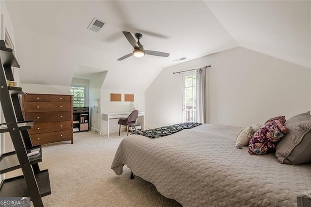 1884 Montrose Dr, East Point, GA 30344 - bedroom featuring vaulted ceiling, visible vents, light colored carpet, and multiple windows