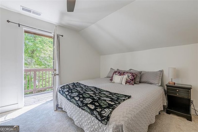 1884 Montrose Dr, East Point, GA 30344 - bedroom featuring light carpet, visible vents, lofted ceiling, access to outside, and ceiling fan