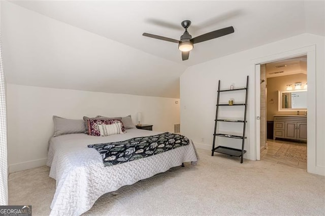 1884 Montrose Dr, East Point, GA 30344 - bedroom featuring vaulted ceiling, baseboards, and light carpet