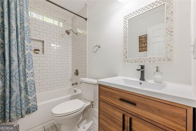 1884 Montrose Dr, East Point, GA 30344 - full bathroom with shower / bath combination with curtain, toilet, and vanity