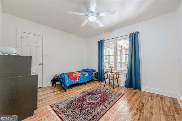 1884 Montrose Dr, East Point, GA 30344 - bedroom with baseboards, wood finished floors, and ceiling fan