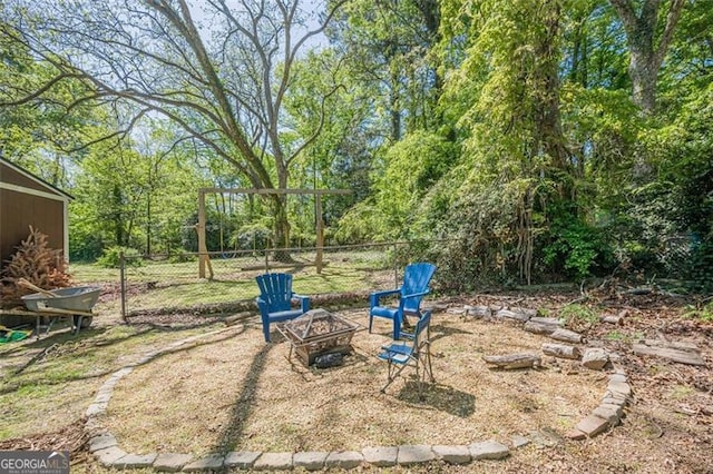 1884 Montrose Dr, East Point, GA 30344 - view of yard featuring fence and an outdoor fire pit