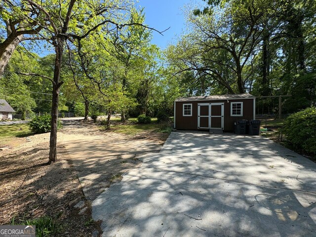 1884 Montrose Dr, East Point, GA 30344 - view of shed featuring driveway