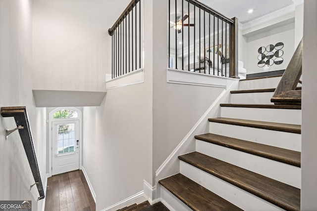 stairs with recessed lighting, baseboards, and hardwood / wood-style flooring