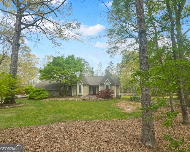 view of side of home featuring a lawn