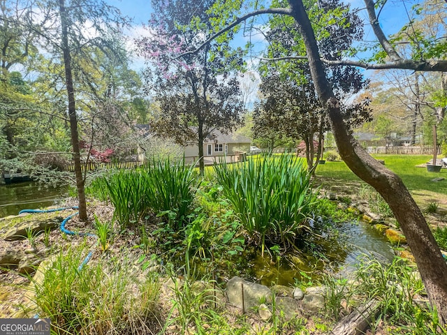 view of yard with fence