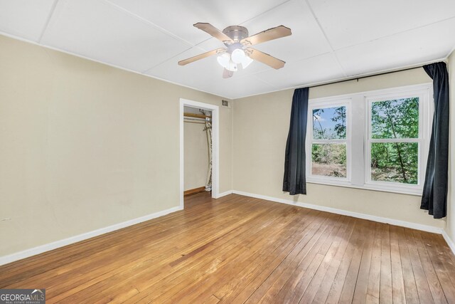 139 Cherokee Dr, Jackson, GA 30233 - interior space with baseboards, ceiling fan, and hardwood / wood-style flooring