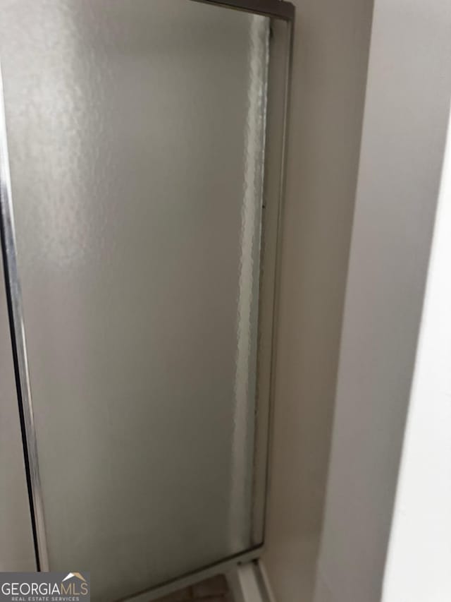 details featuring a shower stall
