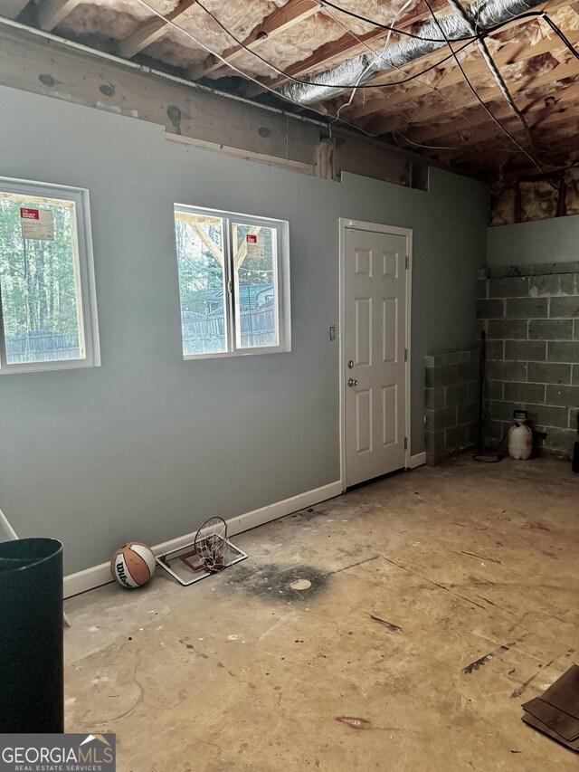 basement featuring baseboards