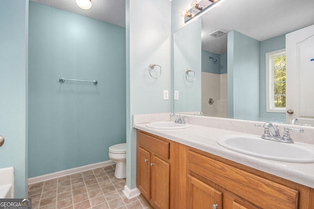 432 Tanner Farm Dr, Rockmart, GA 30153 - bathroom featuring baseboards, toilet, double vanity, a shower, and a tub to relax in