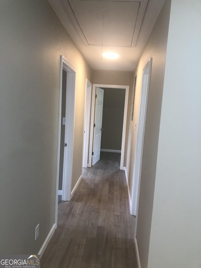 576 Pansy Ave, Macon, GA 31204 - hall with dark wood-style flooring, baseboards, and attic access
