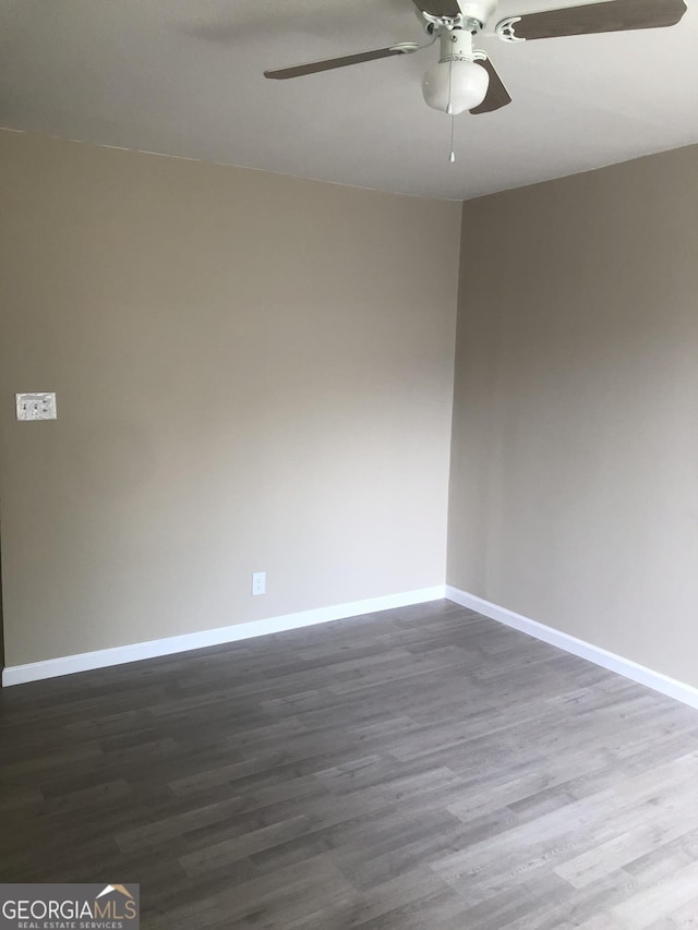 576 Pansy Ave, Macon, GA 31204 - unfurnished room with ceiling fan, baseboards, and dark wood finished floors