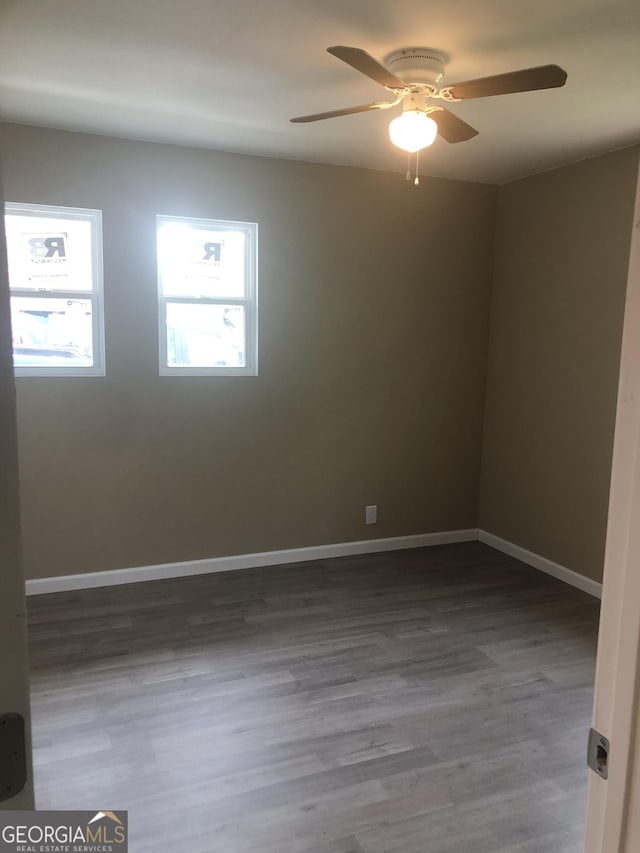 576 Pansy Ave, Macon, GA 31204 - spare room with ceiling fan, wood finished floors, and baseboards