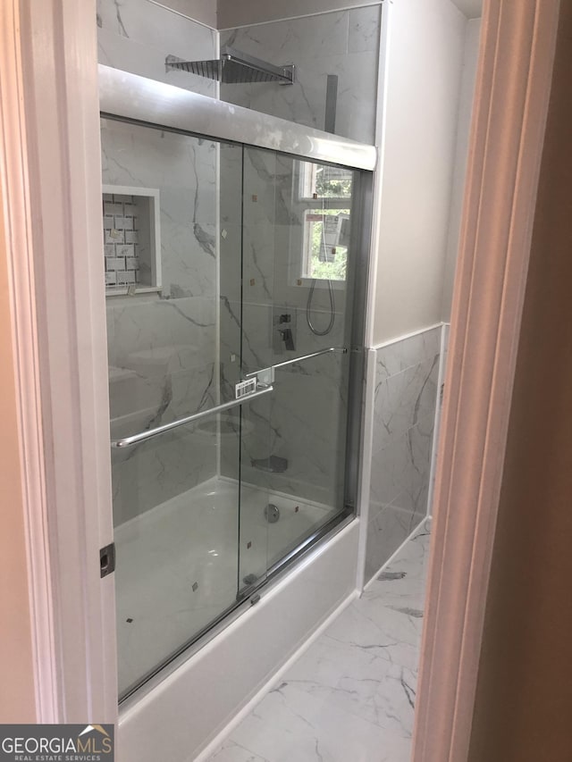 576 Pansy Ave, Macon, GA 31204 - bathroom featuring combined bath / shower with glass door and marble finish floor