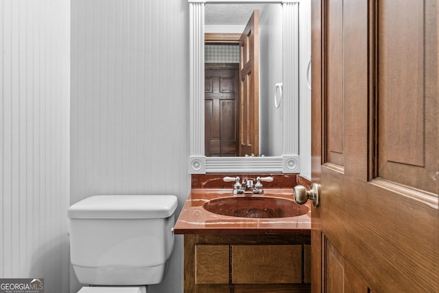 3588 SW Highridge Dr, Conyers, GA 30094 - half bath with toilet, vanity, and a textured ceiling