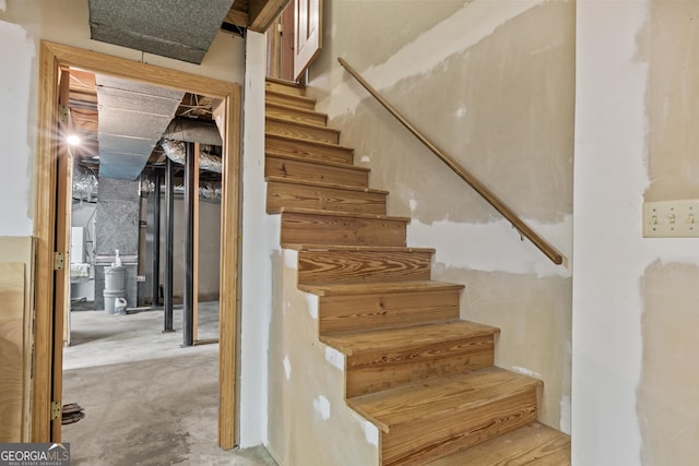 3588 SW Highridge Dr, Conyers, GA 30094 - stairs with unfinished concrete flooring