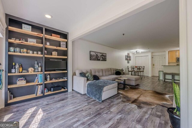 3203 Lenox Rd NE Unit 32, Atlanta, GA 30324 - living room featuring wood finished floors