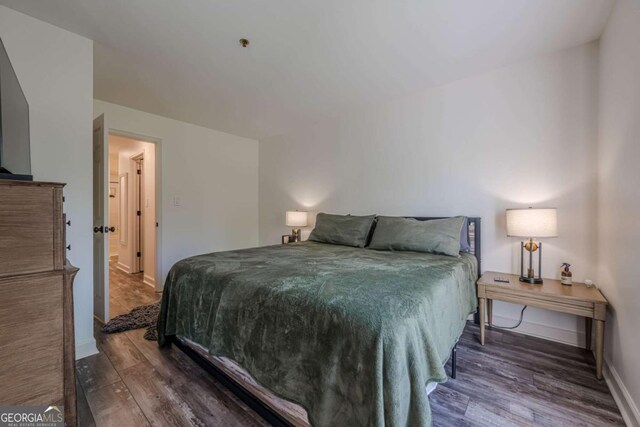 3203 Lenox Rd NE Unit 32, Atlanta, GA 30324 - bedroom with wood finished floors and baseboards