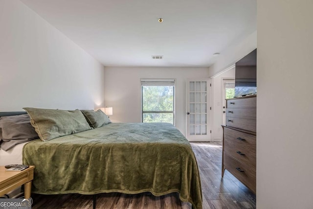 3203 Lenox Rd NE Unit 32, Atlanta, GA 30324 - bedroom featuring wood finished floors and access to outside