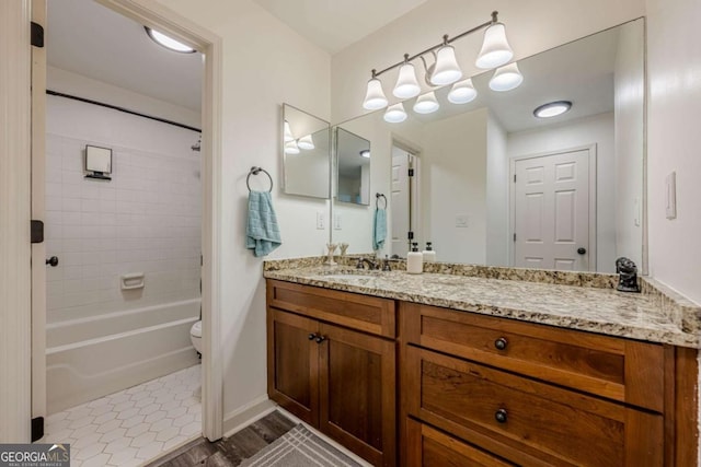 3203 Lenox Rd NE Unit 32, Atlanta, GA 30324 - full bath with vanity, toilet, washtub / shower combination, and baseboards